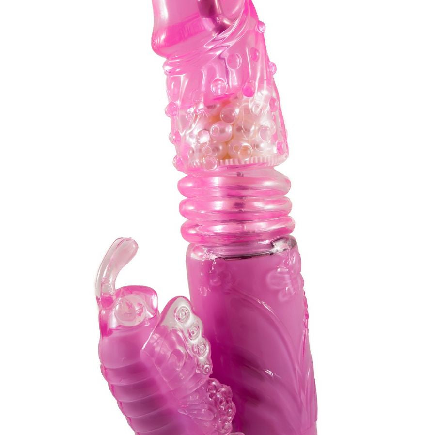 Vibrator med upp- och nedrotation och klitorisstimulator