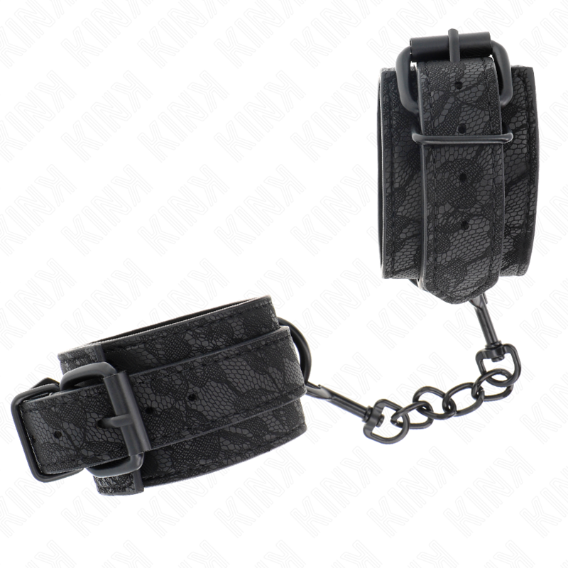 KINK - Handledskuddar i mörk spets, justerbara, svarta 19-26 cm