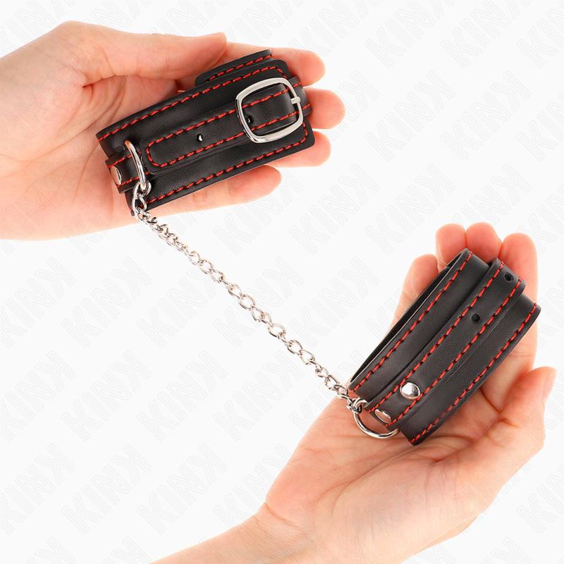 KINK - Små handledsremmar svarta med röd kant justerbara 14-24 cm x 3,5 cm