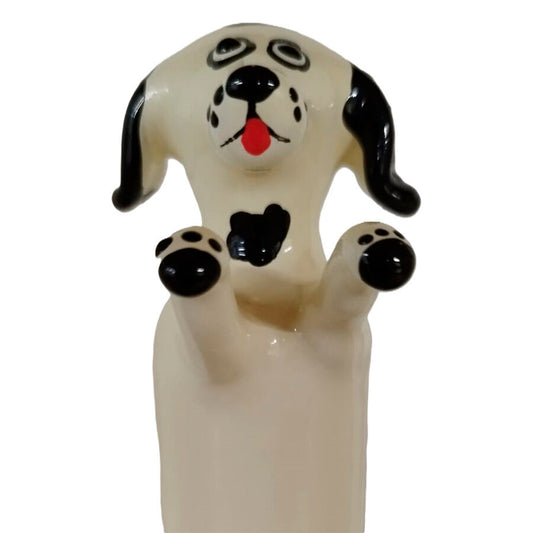 Handmålad kondom med motiv av glad vit hund