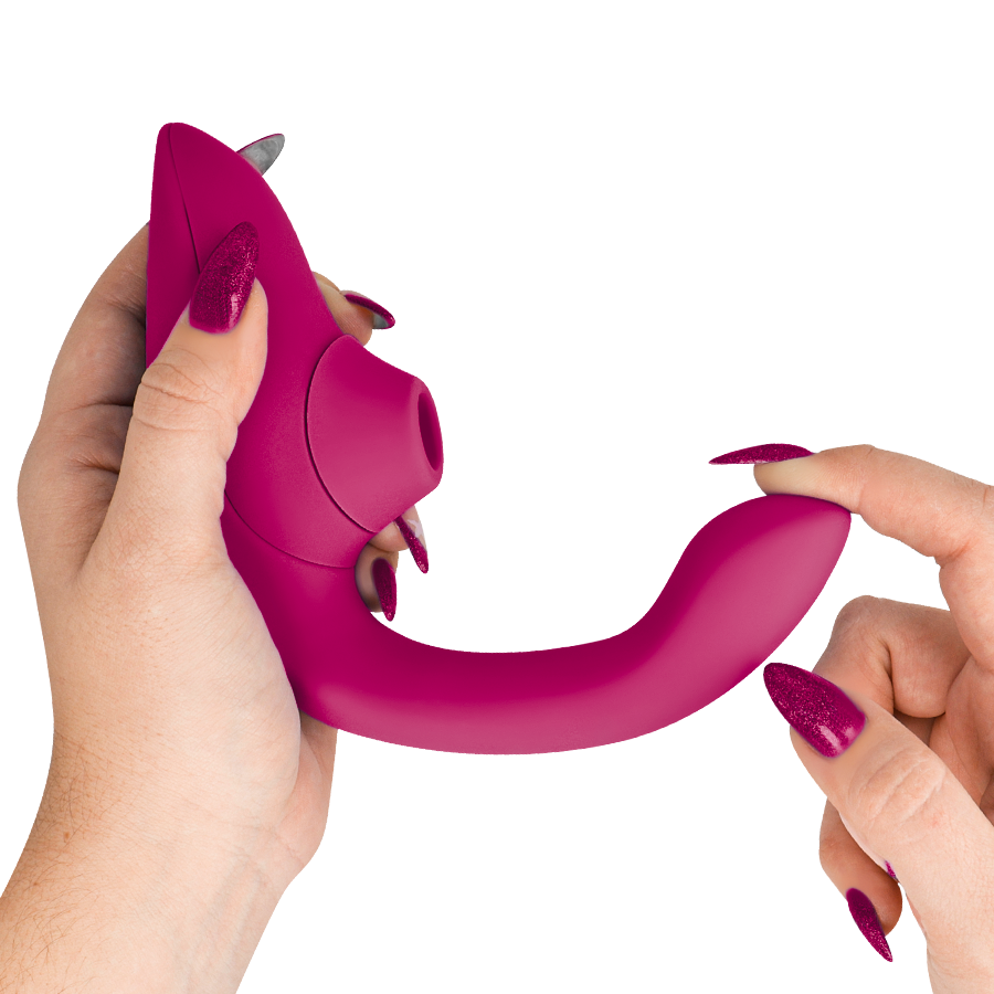Womanizer Blend Rabbit Vibrator i färgen vibrant pink