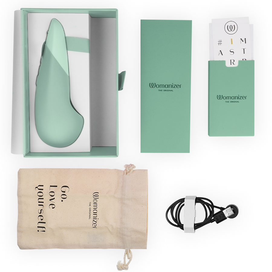 Womanizer Vibe Lay-On Silent Vibrator i färgen sage